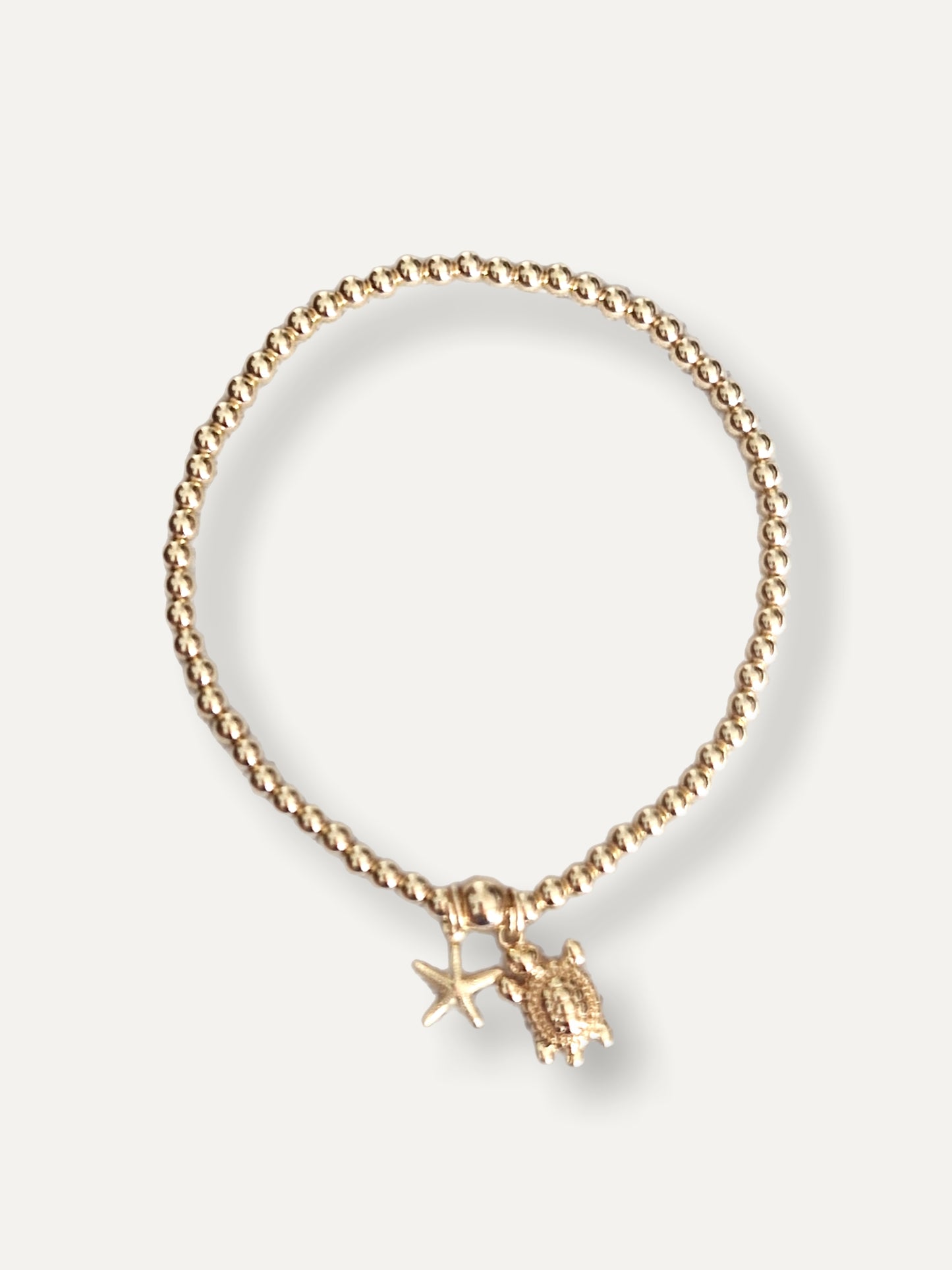 Gold Bobble Bracelet - Gold  'Turtle' & 'Starfish' Charms