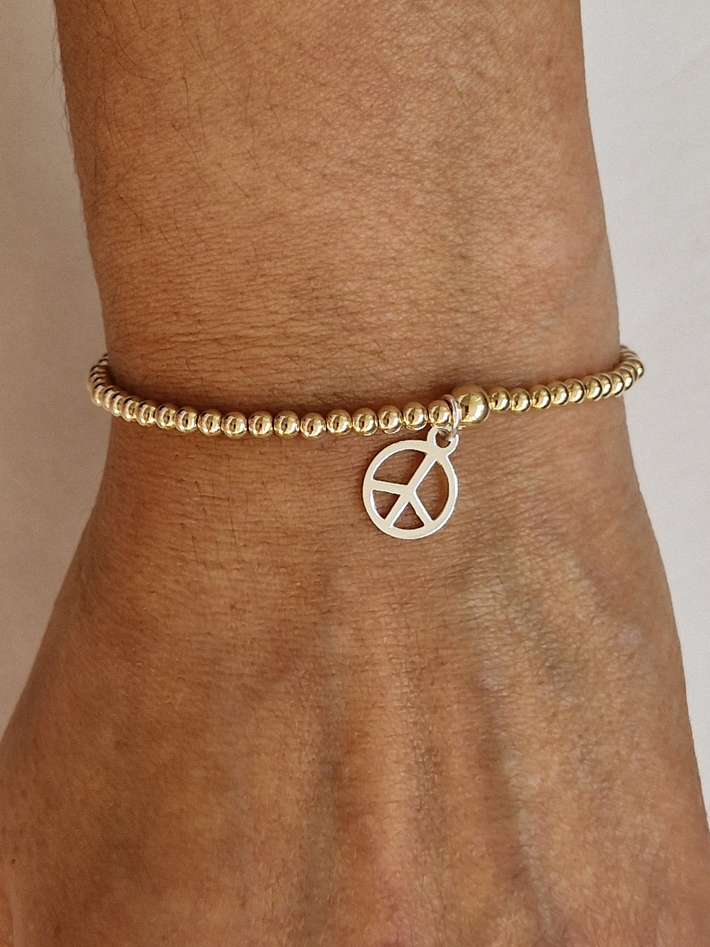 Gold Bobble Bracelet- Silver Peace